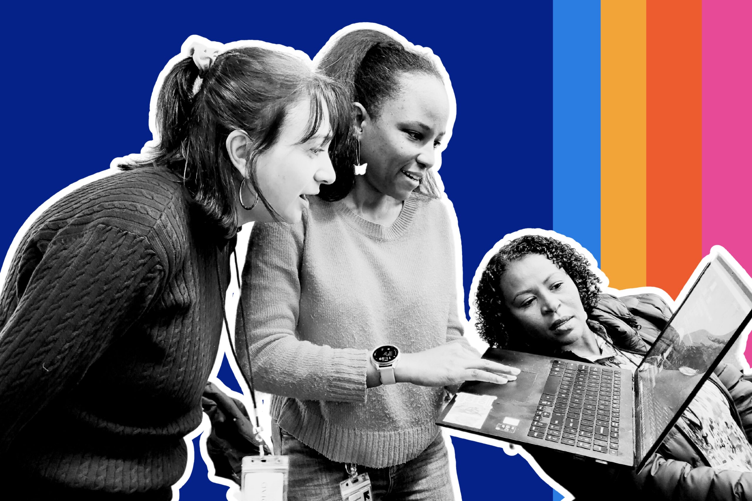 three women looking at a laptop together in discussion